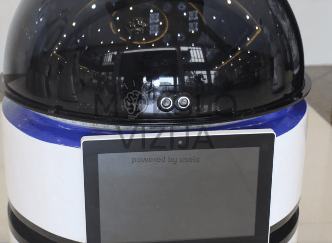 Itin kompaktiškas saugumo robotas su kameromis, jutikliais ir valdymo ekranu