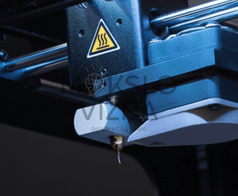 3D spausdintuvo ekstruderis su kaitinimo antgaliu ir įspėjamuoju ženklu apie karštą paviršių.