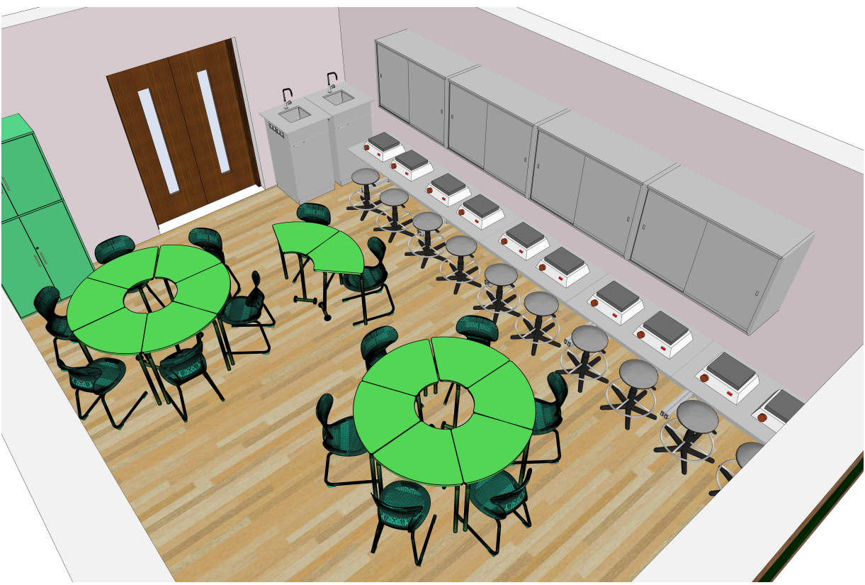 Ergonomiškos klasės išplanavimas: apvalūs stalai diskusijoms, darbo vietos prie sienų ir laikymo sprendimai.