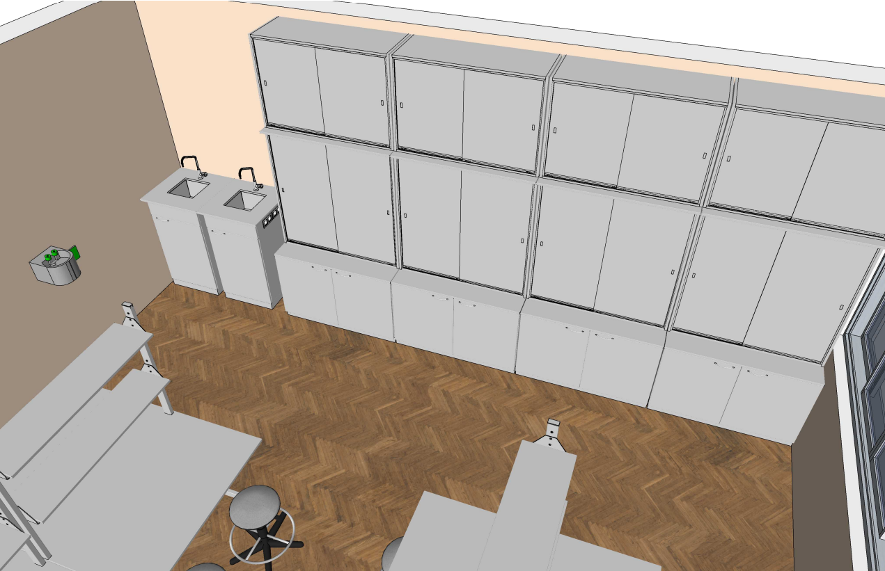 Biologijos, chemijos ir fizikos laboratorijos išplanavimas su grupinio darbo stalais ir saugos sprendimais.