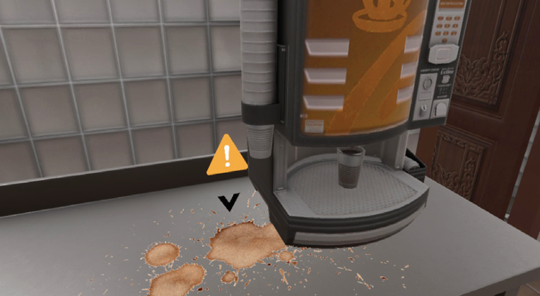 VR maisto saugos mokymo aplinka su išsiliejusiu skysčiu ant stalviršio ir įspėjamuoju ženklu šalia kavos aparato