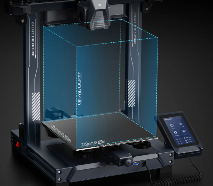 3D spausdintuvas su pažymėtu 225 x 225 x 265 mm spausdinimo tūriu ir šviesiai mėlyna darbo zona
