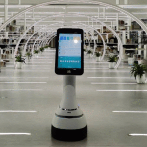 Mobilus dirbtinio intelekto serviso robotas su ekranu modernioje bibliotekoje, skirtas navigacijai ir informacijos pateikimui.